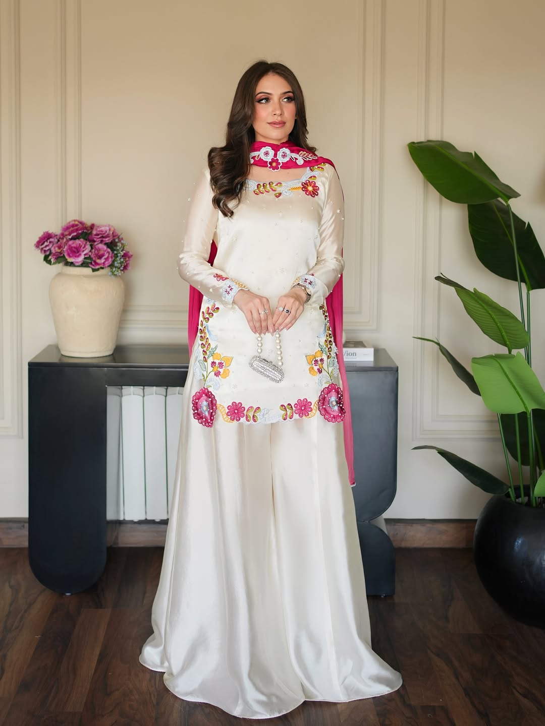 Ivory embroidered silk ensemble with fuchsia dupatta wedding guest outfit